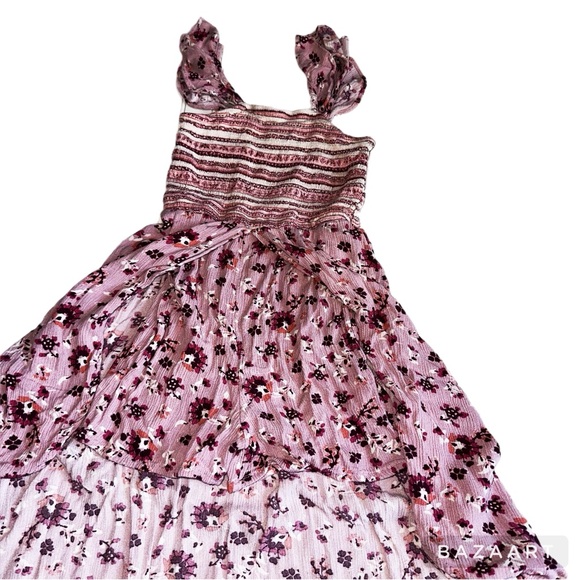 Adorable strappy shorts romper with high/low hem skirt bottom. - Picture 2 of 3